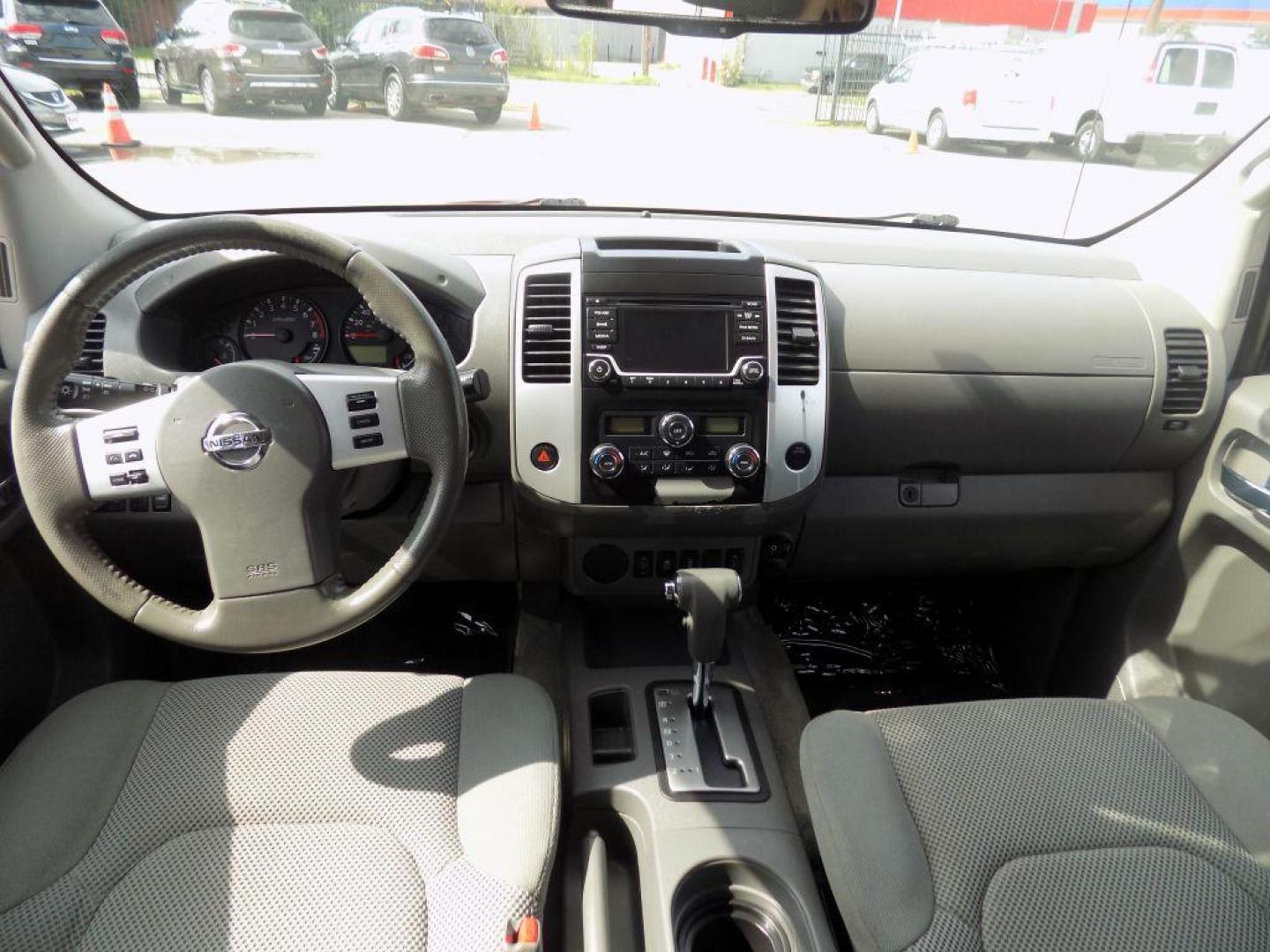 2017 RED NISSAN FRONTIER S (1N6DD0ER9HN) with an 4.0L engine, Automatic transmission, located at 830 E. Canino Rd., Houston, TX, 77037, (281) 405-0440, 38.358219, -81.729942 - Photo#16