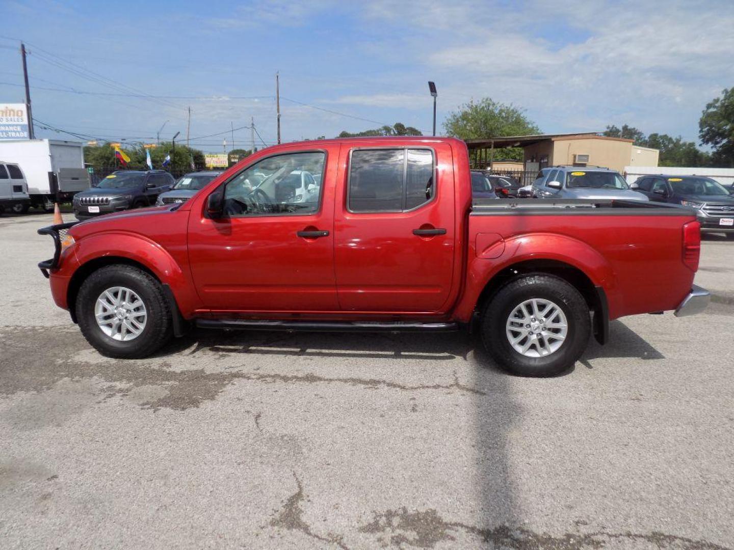 2017 RED NISSAN FRONTIER S (1N6DD0ER9HN) with an 4.0L engine, Automatic transmission, located at 830 E. Canino Rd., Houston, TX, 77037, (281) 405-0440, 38.358219, -81.729942 - Photo#3