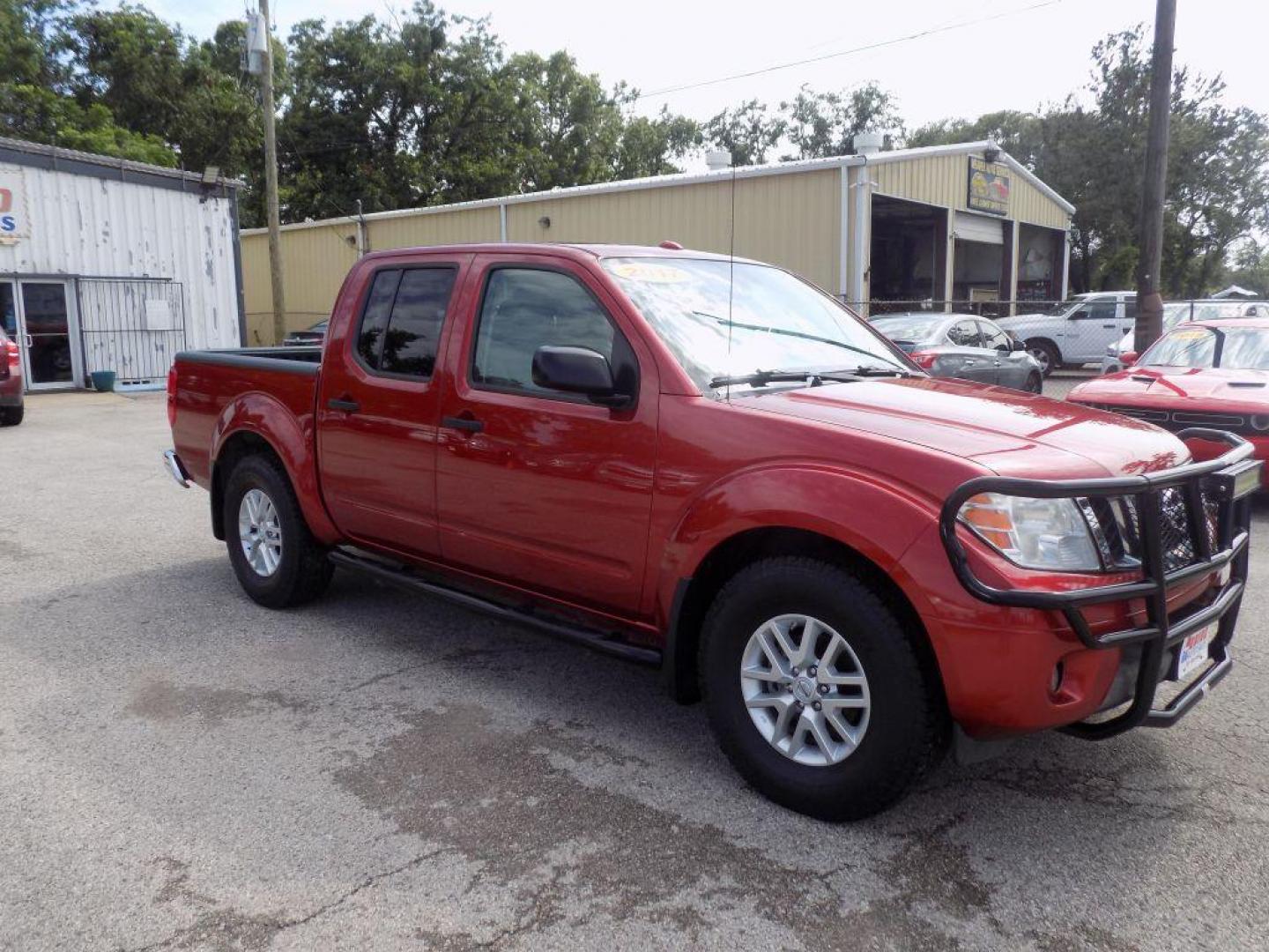 2017 RED NISSAN FRONTIER S (1N6DD0ER9HN) with an 4.0L engine, Automatic transmission, located at 830 E. Canino Rd., Houston, TX, 77037, (281) 405-0440, 38.358219, -81.729942 - Photo#6