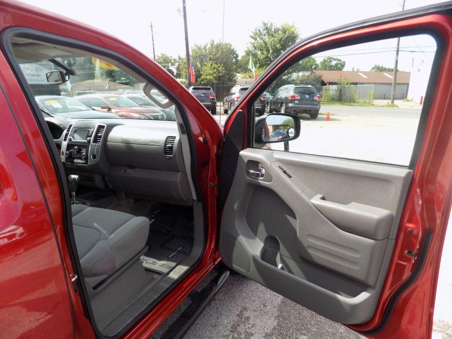 2017 RED NISSAN FRONTIER S (1N6DD0ER9HN) with an 4.0L engine, Automatic transmission, located at 830 E. Canino Rd., Houston, TX, 77037, (281) 405-0440, 38.358219, -81.729942 - Photo#8