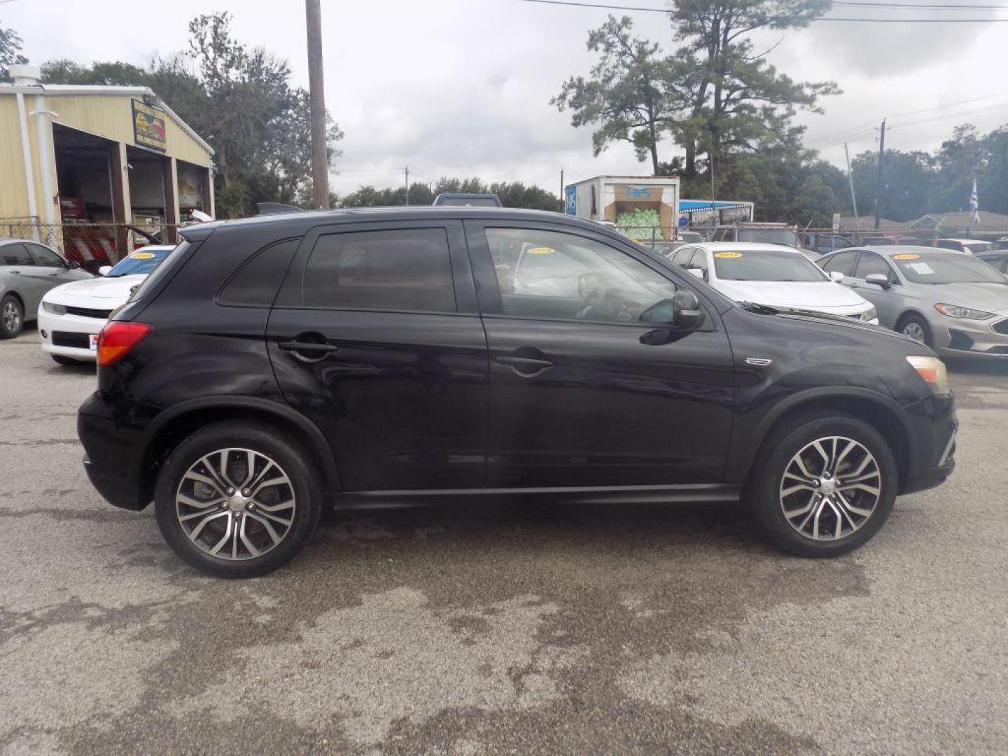 2019 BLACK MITSUBISHI OUTLANDER SPORT ES (JA4AR3AU7KU) with an 2.0L engine, Automatic transmission, located at 830 E. Canino Rd., Houston, TX, 77037, (281) 405-0440, 38.358219, -81.729942 - Photo#1