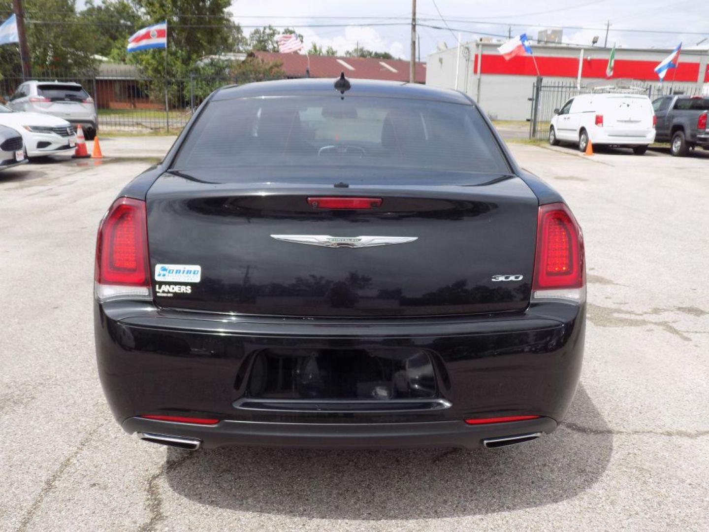 2018 BLACK CHRYSLER 300 TOURING (2C3CCAAG4JH) with an 3.6L engine, Automatic transmission, located at 830 E. Canino Rd., Houston, TX, 77037, (281) 405-0440, 38.358219, -81.729942 - Photo#2