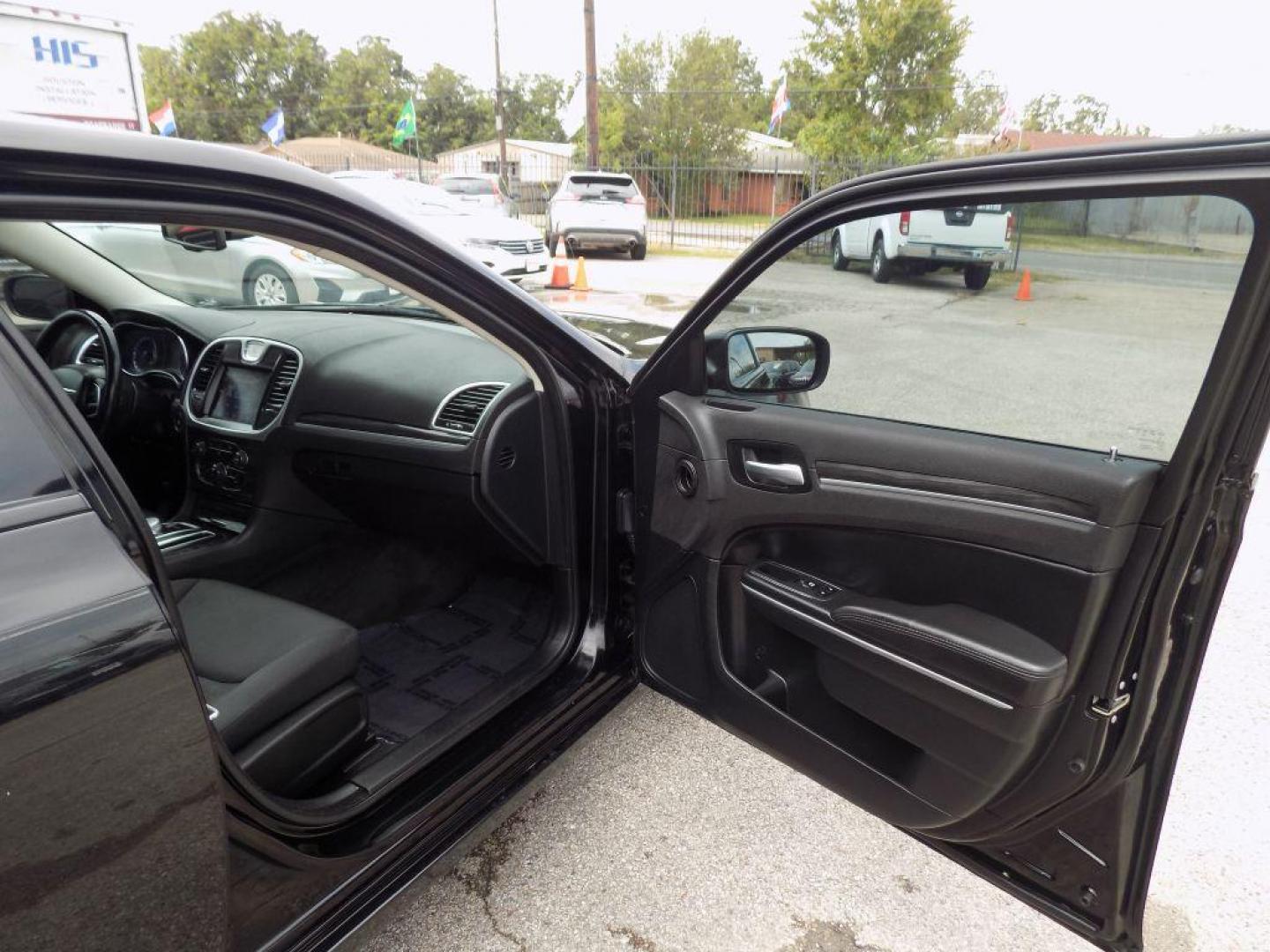 2018 BLACK CHRYSLER 300 TOURING (2C3CCAAG4JH) with an 3.6L engine, Automatic transmission, located at 830 E. Canino Rd., Houston, TX, 77037, (281) 405-0440, 38.358219, -81.729942 - Photo#8