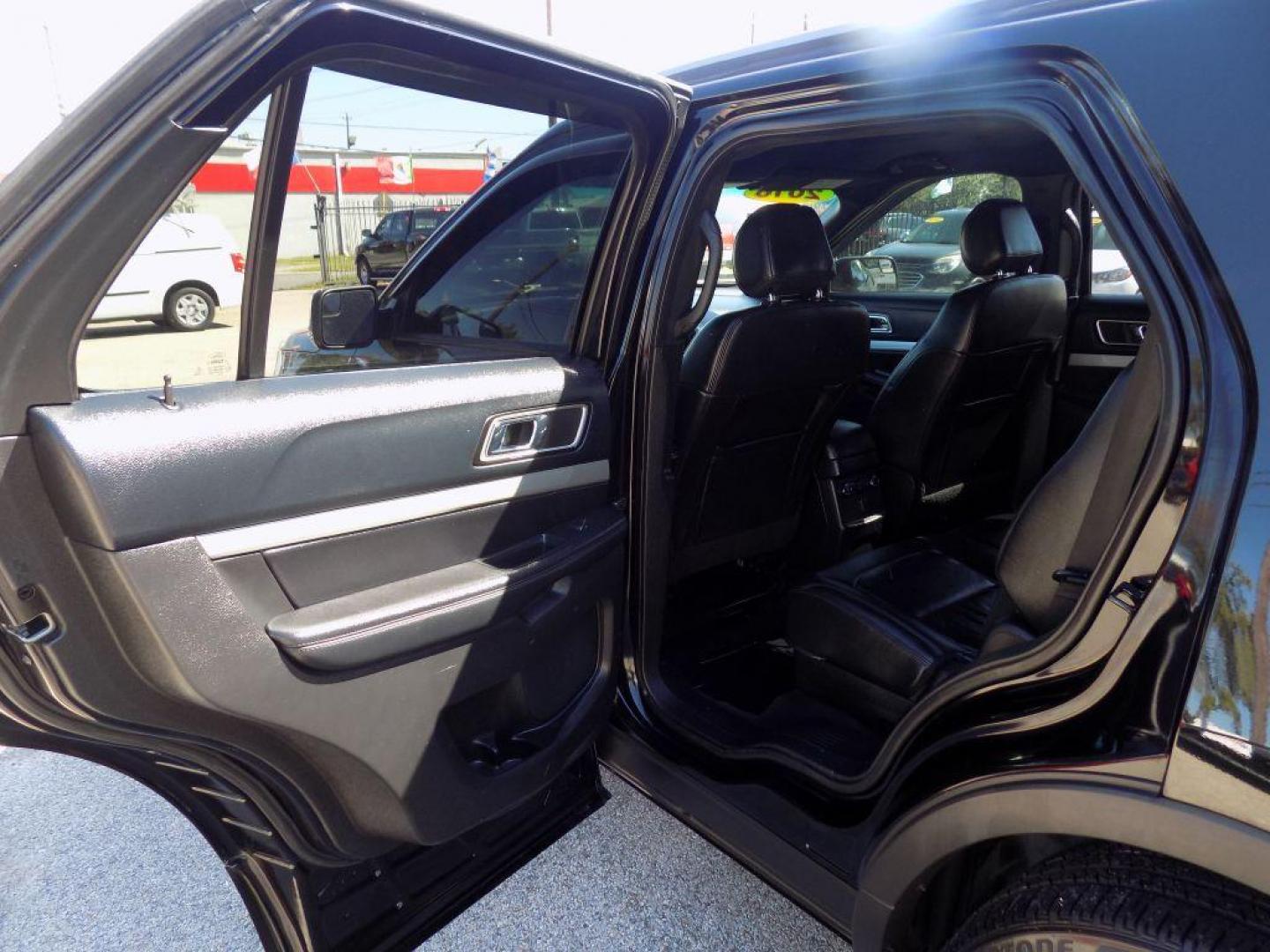 2016 BLACK FORD EXPLORER XLT (1FM5K7D8XGG) with an 3.5L engine, Automatic transmission, located at 830 E. Canino Rd., Houston, TX, 77037, (281) 405-0440, 38.358219, -81.729942 - Photo#12