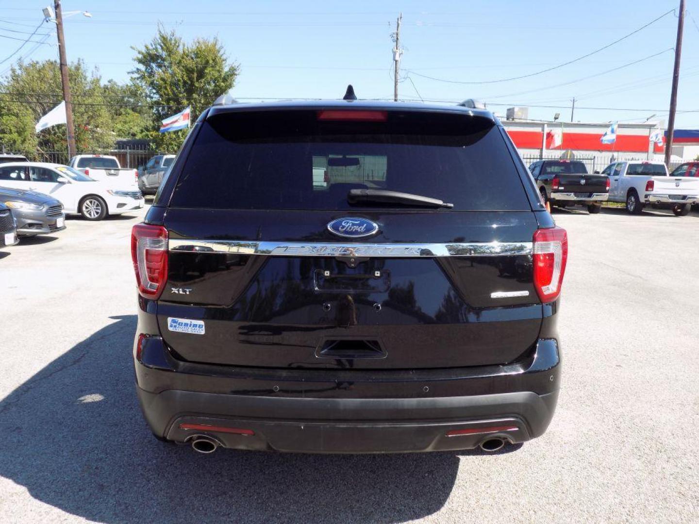 2016 BLACK FORD EXPLORER XLT (1FM5K7D8XGG) with an 3.5L engine, Automatic transmission, located at 830 E. Canino Rd., Houston, TX, 77037, (281) 405-0440, 38.358219, -81.729942 - Photo#2