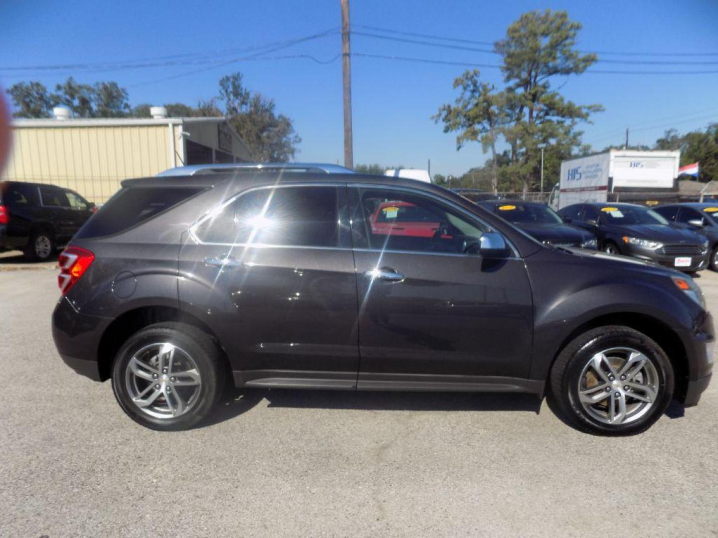 2016 BLACK CHEVROLET EQUINOX LTZ (2GNALDEKXG6) with an 2.4L engine, Automatic transmission, located at 830 E. Canino Rd., Houston, TX, 77037, (281) 405-0440, 38.358219, -81.729942 - Photo#1