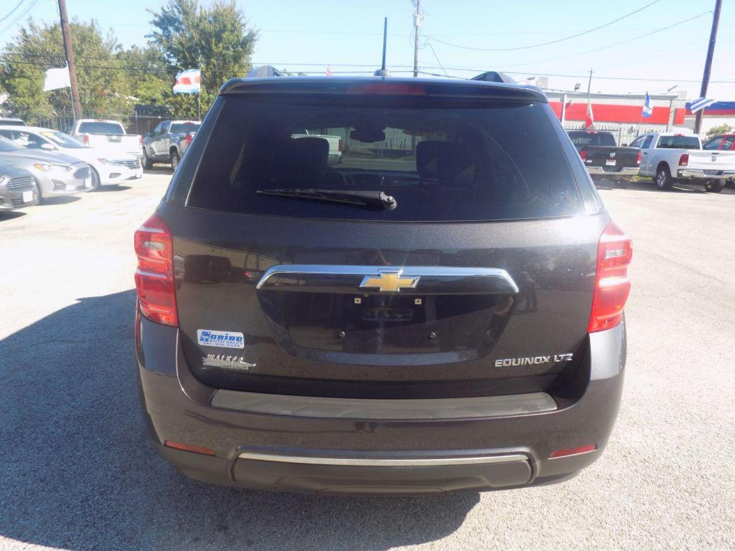 2016 BLACK CHEVROLET EQUINOX LTZ (2GNALDEKXG6) with an 2.4L engine, Automatic transmission, located at 830 E. Canino Rd., Houston, TX, 77037, (281) 405-0440, 38.358219, -81.729942 - Photo#2