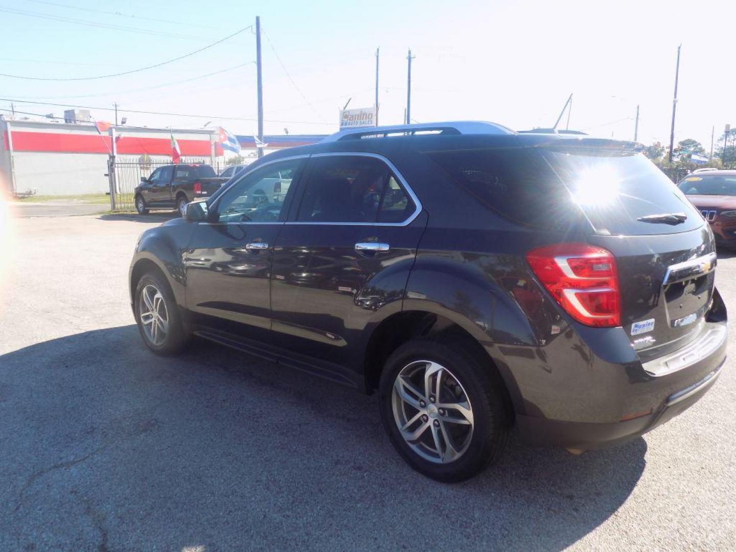 2016 BLACK CHEVROLET EQUINOX LTZ (2GNALDEKXG6) with an 2.4L engine, Automatic transmission, located at 830 E. Canino Rd., Houston, TX, 77037, (281) 405-0440, 38.358219, -81.729942 - Photo#4