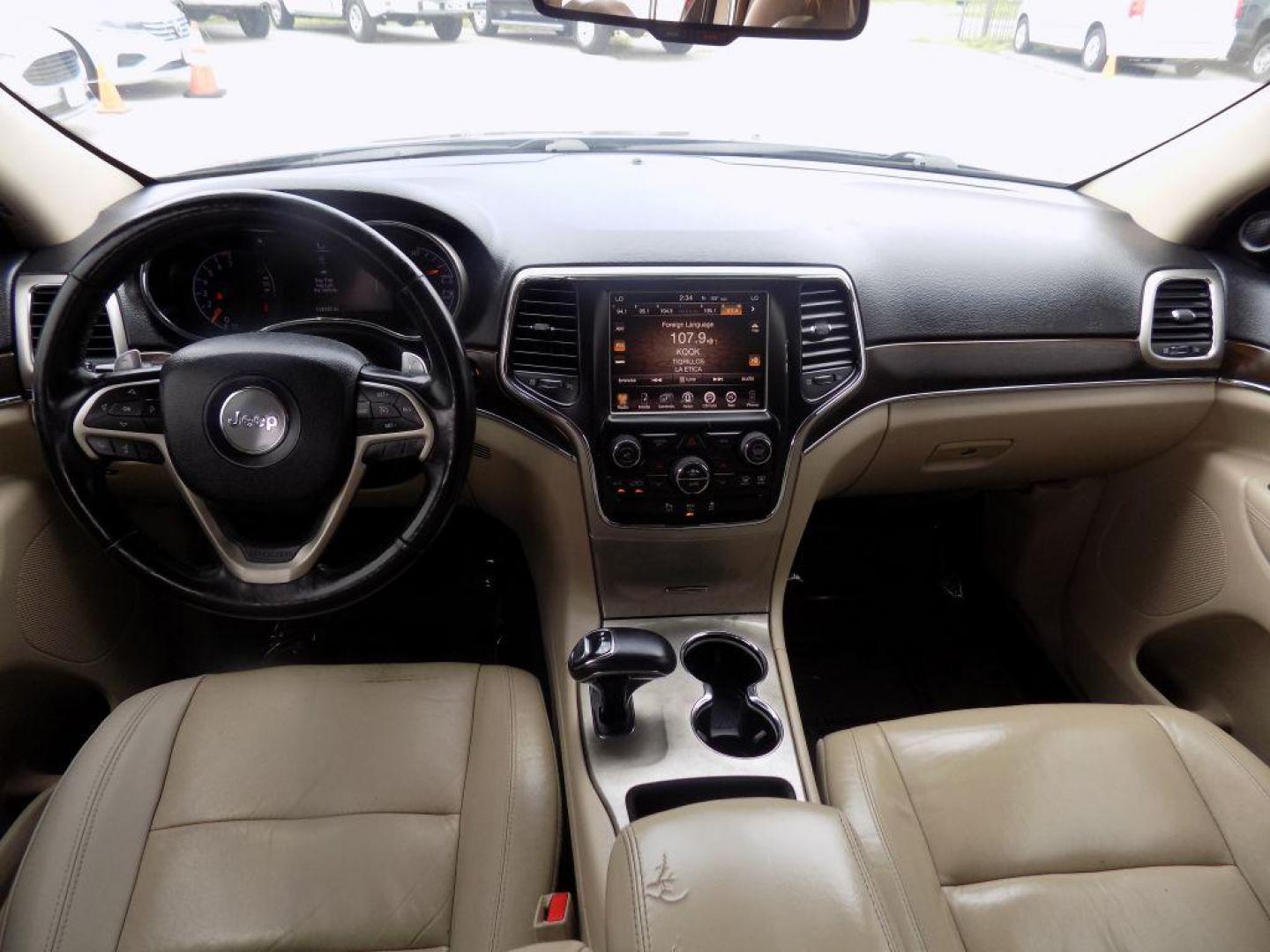 2015 BLACK JEEP GRAND CHEROKEE LIMITED (1C4RJEBGXFC) with an 3.6L engine, Automatic transmission, located at 830 E. Canino Rd., Houston, TX, 77037, (281) 405-0440, 38.358219, -81.729942 - Photo#14