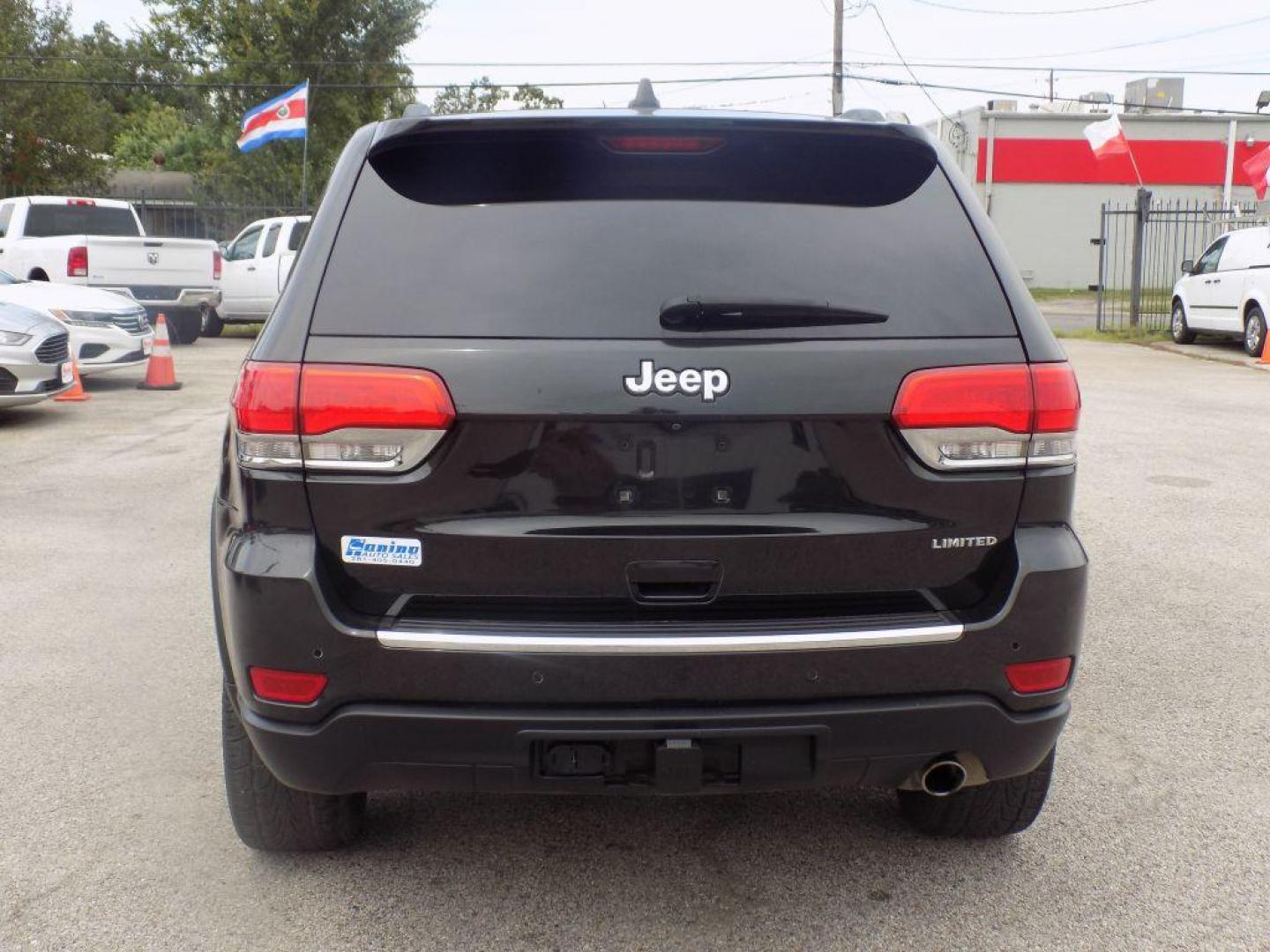 2015 BLACK JEEP GRAND CHEROKEE LIMITED (1C4RJEBGXFC) with an 3.6L engine, Automatic transmission, located at 830 E. Canino Rd., Houston, TX, 77037, (281) 405-0440, 38.358219, -81.729942 - Photo#2