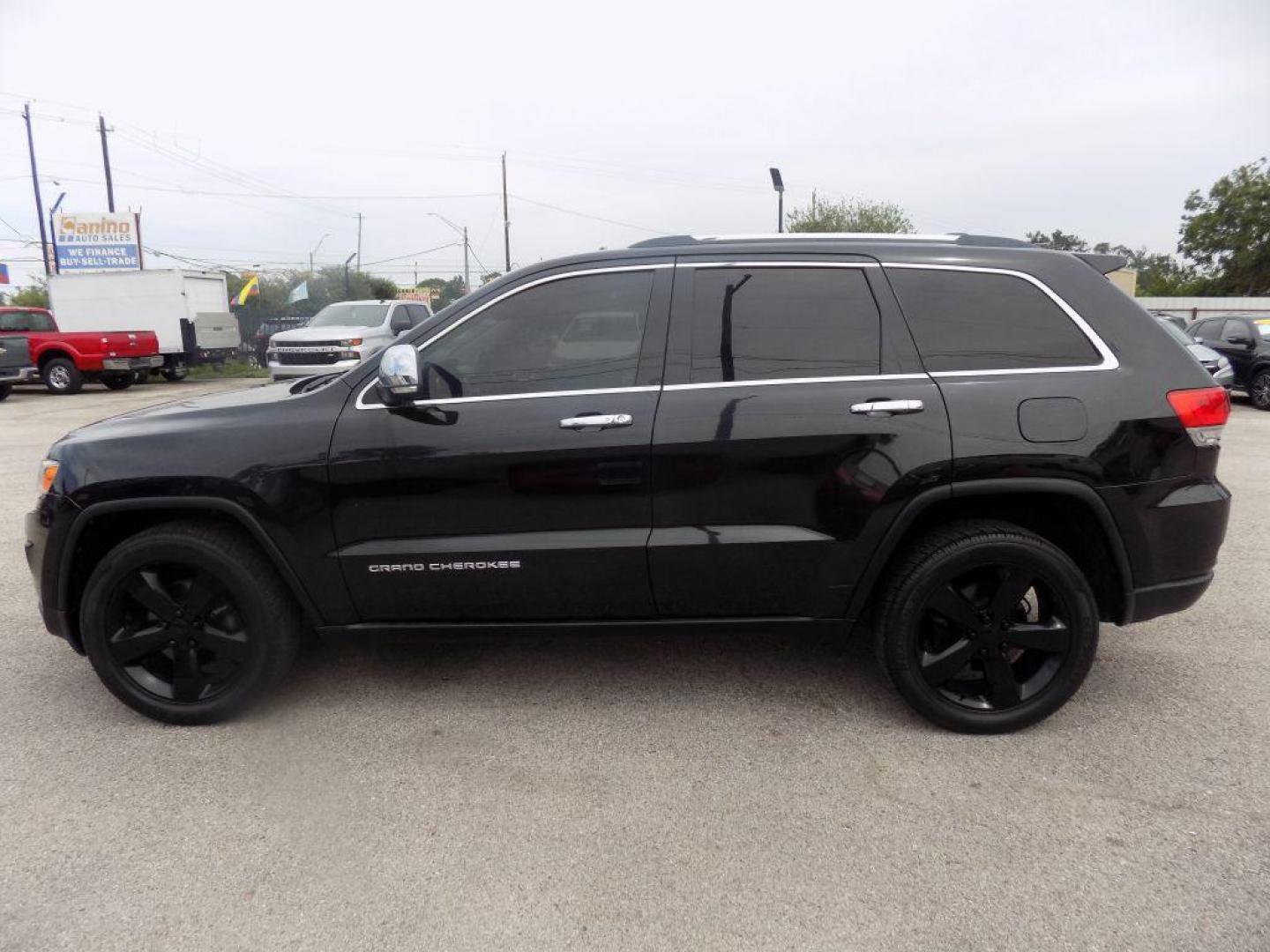 2015 BLACK JEEP GRAND CHEROKEE LIMITED (1C4RJEBGXFC) with an 3.6L engine, Automatic transmission, located at 830 E. Canino Rd., Houston, TX, 77037, (281) 405-0440, 38.358219, -81.729942 - Photo#3