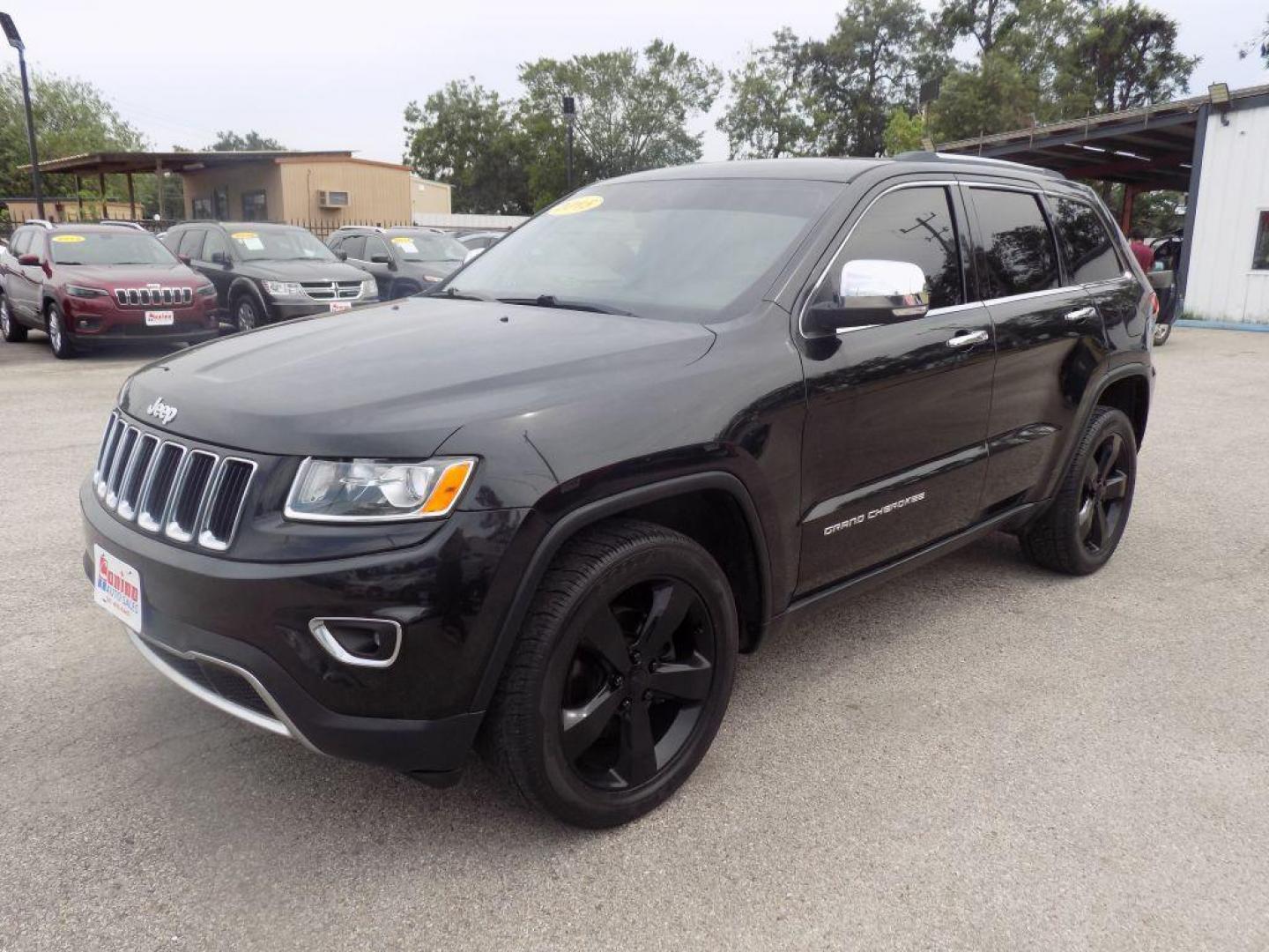 2015 BLACK JEEP GRAND CHEROKEE LIMITED (1C4RJEBGXFC) with an 3.6L engine, Automatic transmission, located at 830 E. Canino Rd., Houston, TX, 77037, (281) 405-0440, 38.358219, -81.729942 - Photo#5