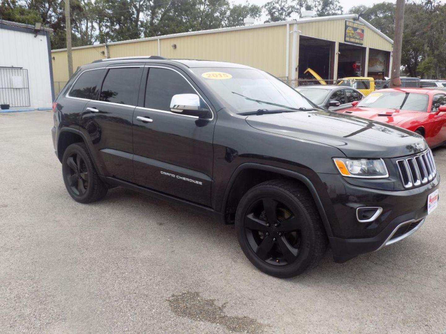 2015 BLACK JEEP GRAND CHEROKEE LIMITED (1C4RJEBGXFC) with an 3.6L engine, Automatic transmission, located at 830 E. Canino Rd., Houston, TX, 77037, (281) 405-0440, 38.358219, -81.729942 - Photo#6