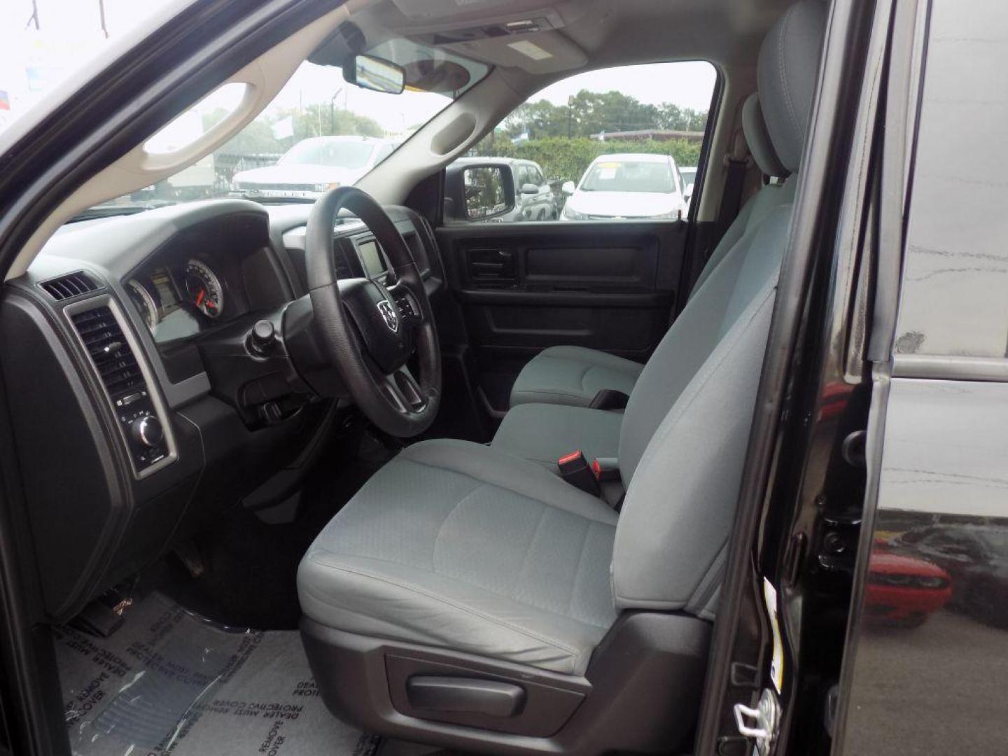 2017 BLACK RAM 1500 ST (3C6RR6KTXHG) with an 5.7L engine, Automatic transmission, located at 830 E. Canino Rd., Houston, TX, 77037, (281) 405-0440, 38.358219, -81.729942 - Photo#16