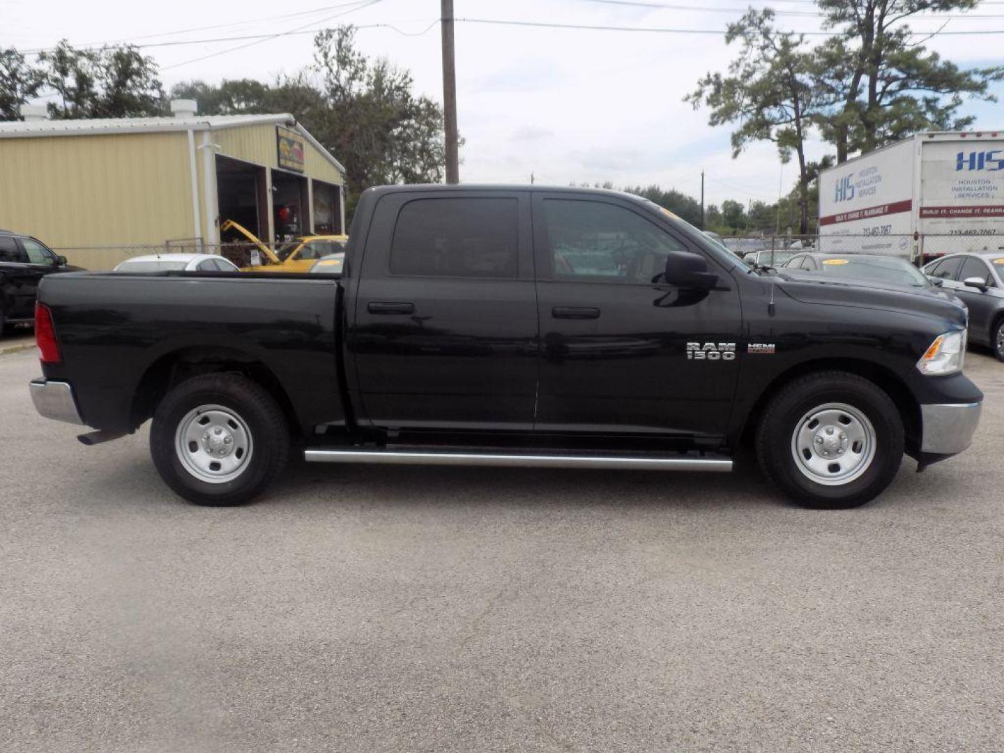 2017 BLACK RAM 1500 ST (3C6RR6KTXHG) with an 5.7L engine, Automatic transmission, located at 830 E. Canino Rd., Houston, TX, 77037, (281) 405-0440, 38.358219, -81.729942 - Photo#1