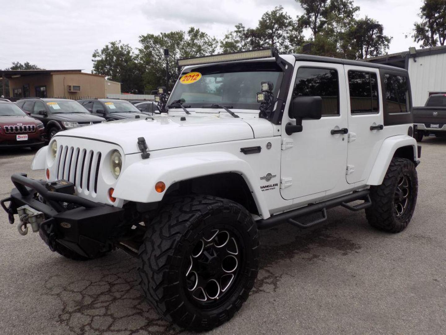 2012 WHITE JEEP WRANGLER UNLIMI SPORT (1C4HJWDG4CL) with an 3.6L engine, Automatic transmission, located at 830 E. Canino Rd., Houston, TX, 77037, (281) 405-0440, 38.358219, -81.729942 - Photo#5