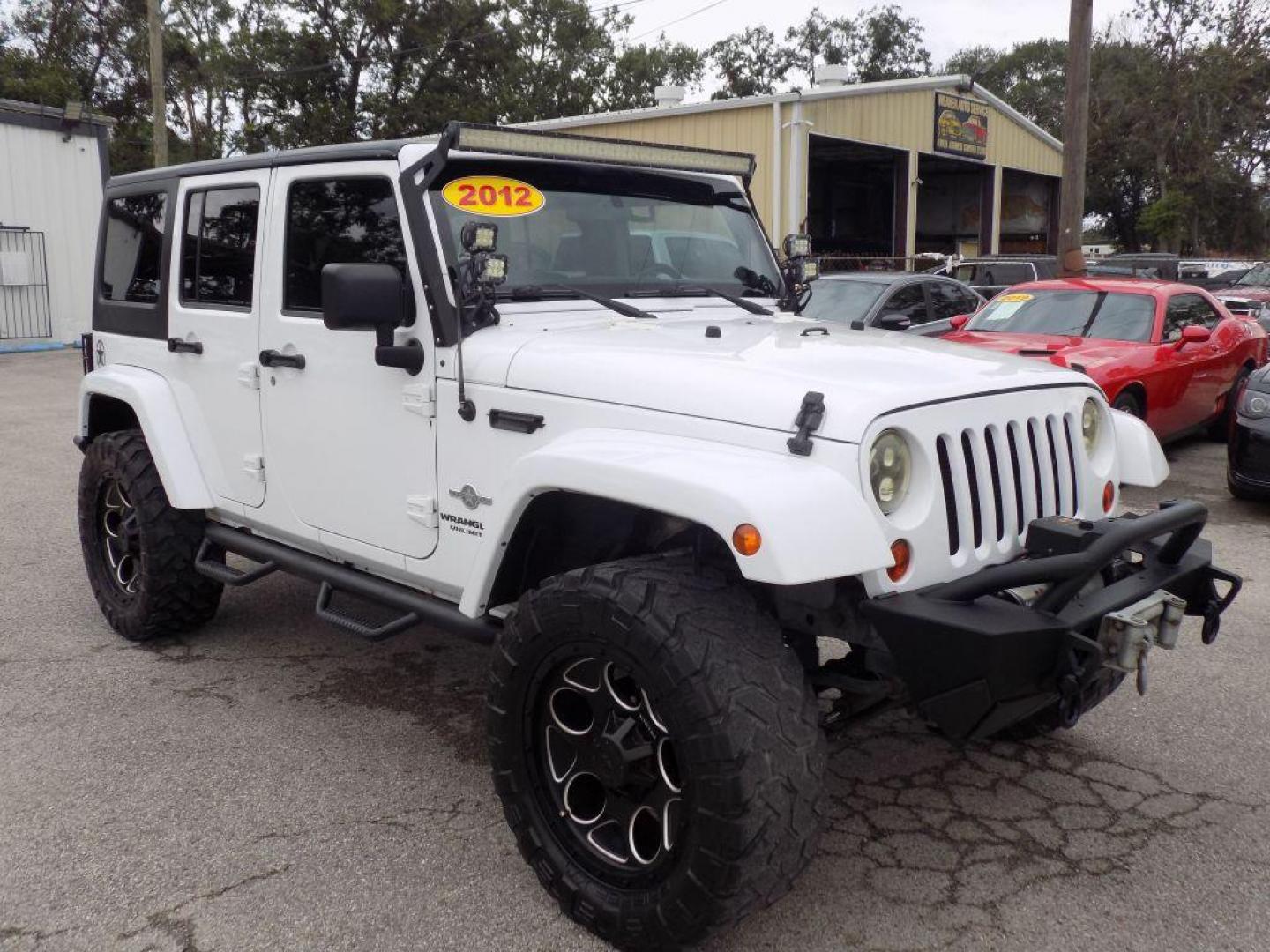 2012 WHITE JEEP WRANGLER UNLIMI SPORT (1C4HJWDG4CL) with an 3.6L engine, Automatic transmission, located at 830 E. Canino Rd., Houston, TX, 77037, (281) 405-0440, 38.358219, -81.729942 - Photo#6