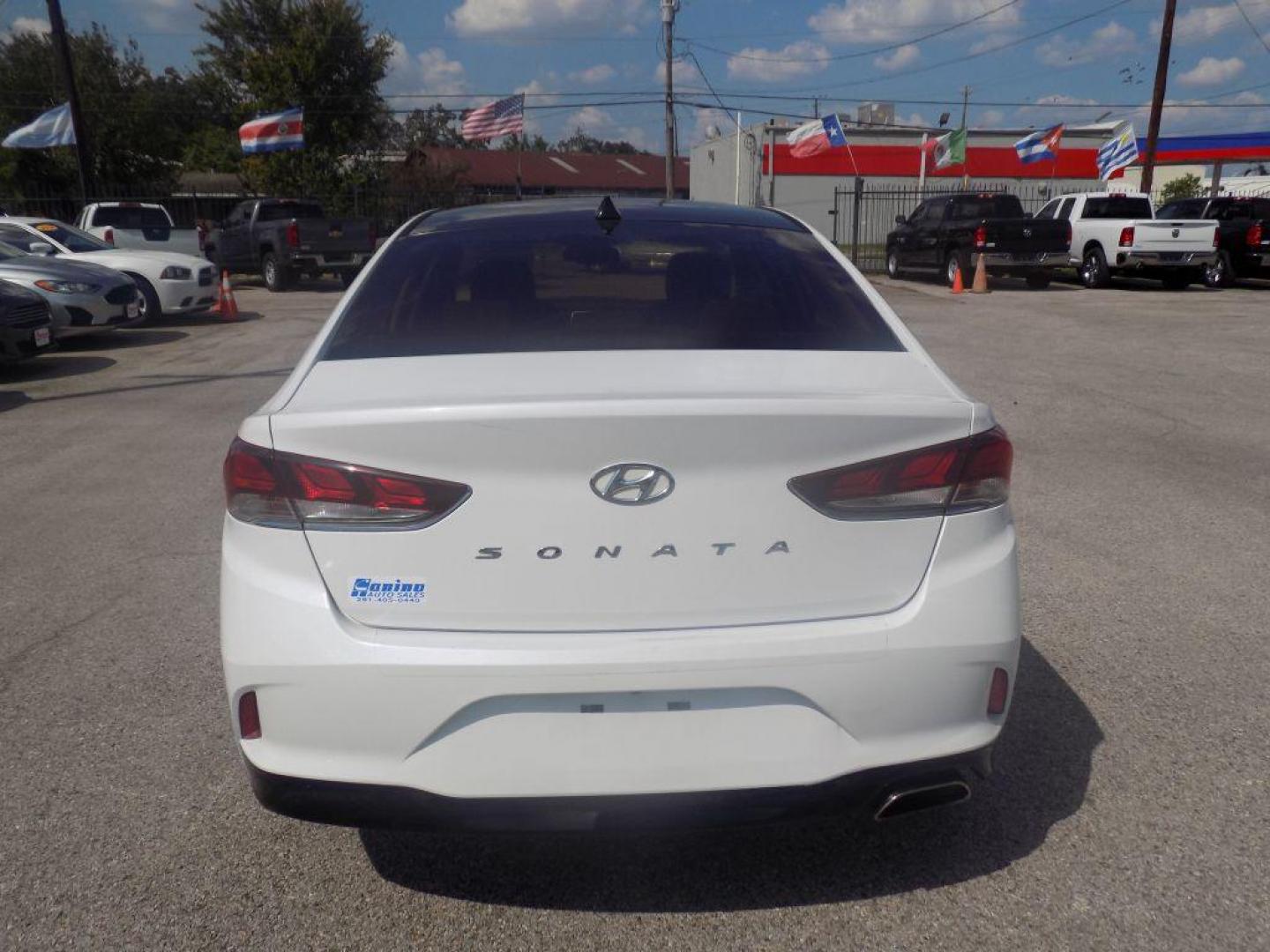 2018 WHITE HYUNDAI SONATA SPORT (5NPE34AF2JH) with an 2.4L engine, Automatic transmission, located at 830 E. Canino Rd., Houston, TX, 77037, (281) 405-0440, 38.358219, -81.729942 - Photo#2