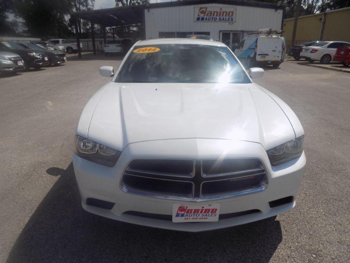 2014 WHITE DODGE CHARGER SE (2C3CDXBGXEH) with an 3.6L engine, Automatic transmission, located at 830 E. Canino Rd., Houston, TX, 77037, (281) 405-0440, 38.358219, -81.729942 - Photo#0