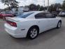 2014 WHITE DODGE CHARGER SE (2C3CDXBGXEH) with an 3.6L engine, Automatic transmission, located at 830 E. Canino Rd., Houston, TX, 77037, (281) 405-0440, 38.358219, -81.729942 - Photo#7