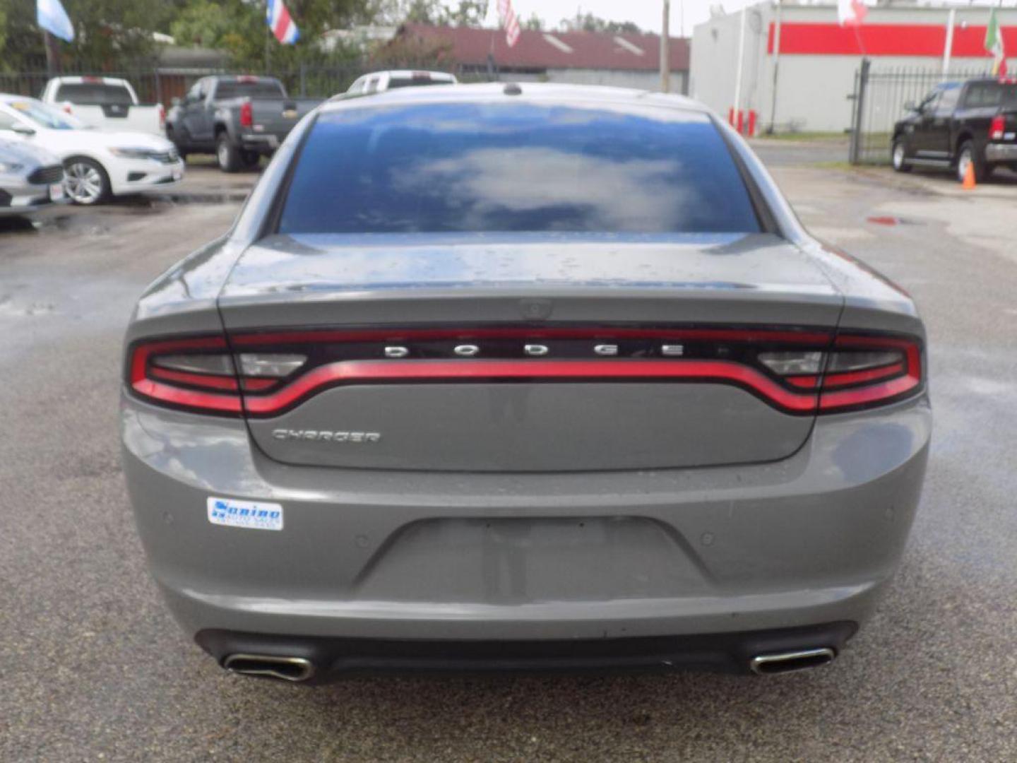 2018 GRAY DODGE CHARGER SXT (2C3CDXBG7JH) with an 3.6L engine, Automatic transmission, located at 830 E. Canino Rd., Houston, TX, 77037, (281) 405-0440, 38.358219, -81.729942 - Photo#2