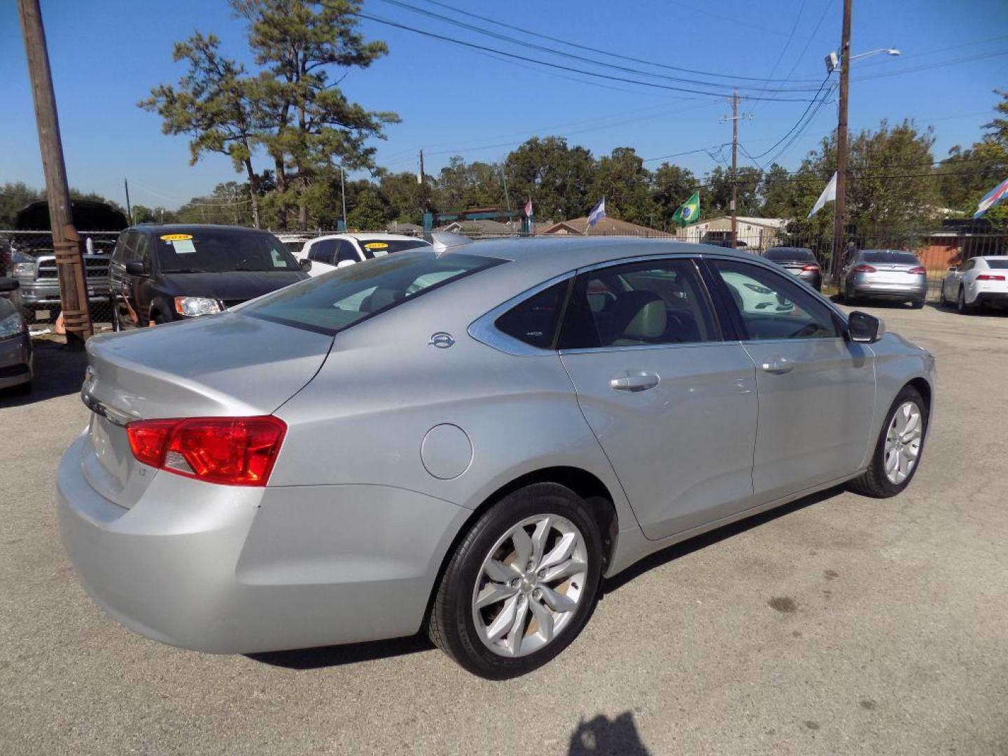 2017 SILVER CHEVROLET IMPALA LT (2G1105S37H9) with an 3.6L engine, Automatic transmission, located at 830 E. Canino Rd., Houston, TX, 77037, (281) 405-0440, 38.358219, -81.729942 - Photo#1