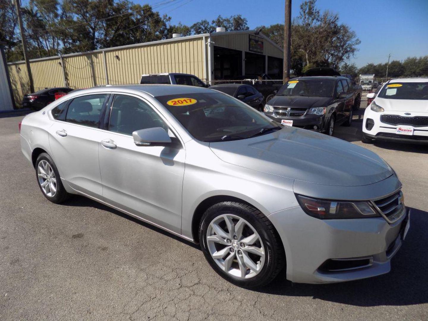 2017 SILVER CHEVROLET IMPALA LT (2G1105S37H9) with an 3.6L engine, Automatic transmission, located at 830 E. Canino Rd., Houston, TX, 77037, (281) 405-0440, 38.358219, -81.729942 - Photo#2