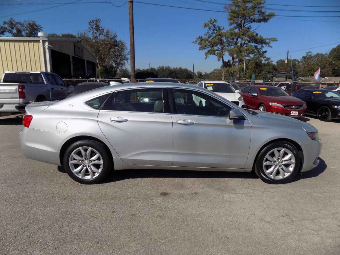 2017 SILVER CHEVROLET IMPALA LT (2G1105S37H9) with an 3.6L engine, Automatic transmission, located at 830 E. Canino Rd., Houston, TX, 77037, (281) 405-0440, 38.358219, -81.729942 - Photo#7