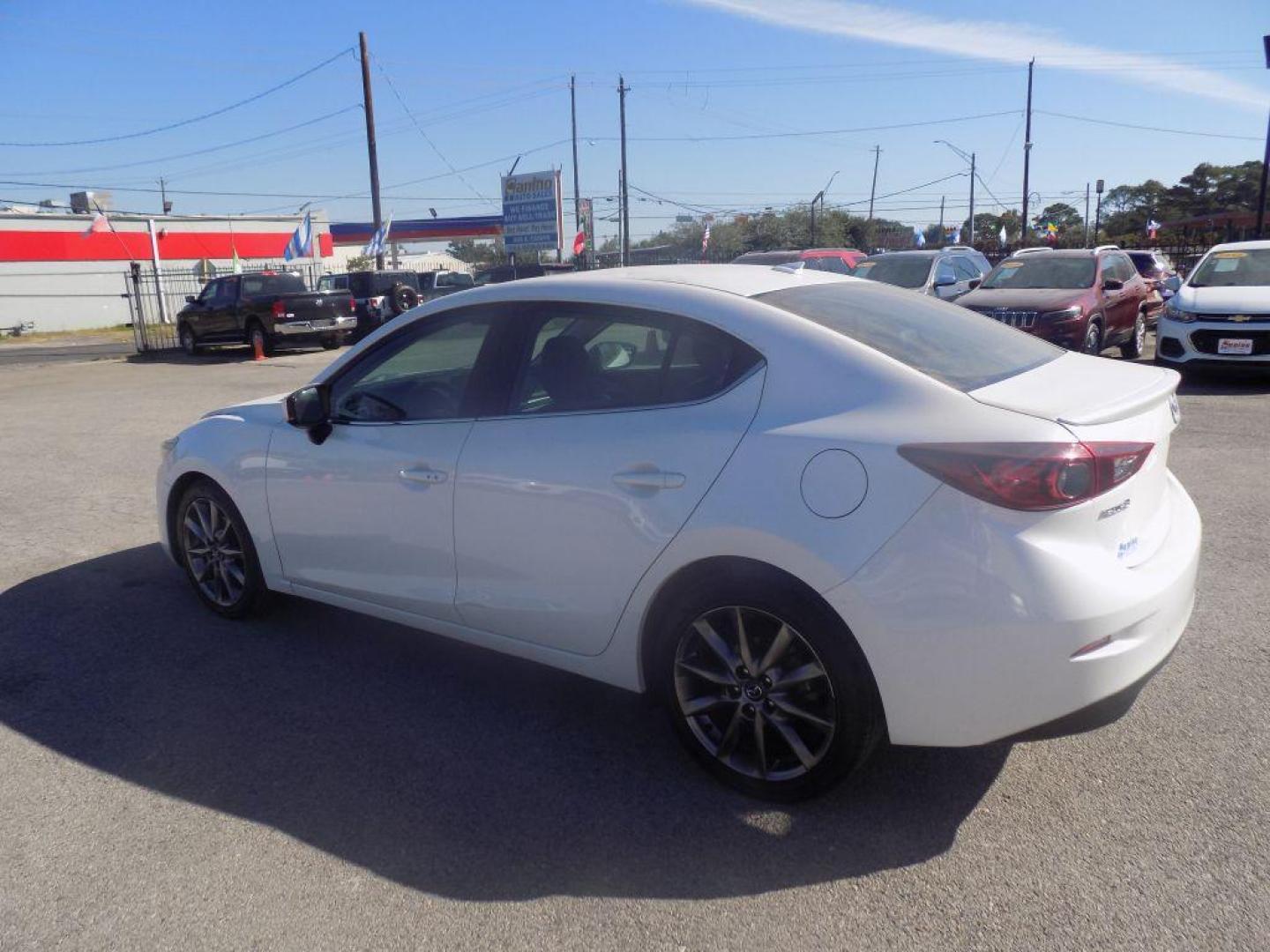 2018 WHITE MAZDA 3 TOURING (3MZBN1V39JM) with an 2.5L engine, Automatic transmission, located at 830 E. Canino Rd., Houston, TX, 77037, (281) 405-0440, 38.358219, -81.729942 - Photo#4