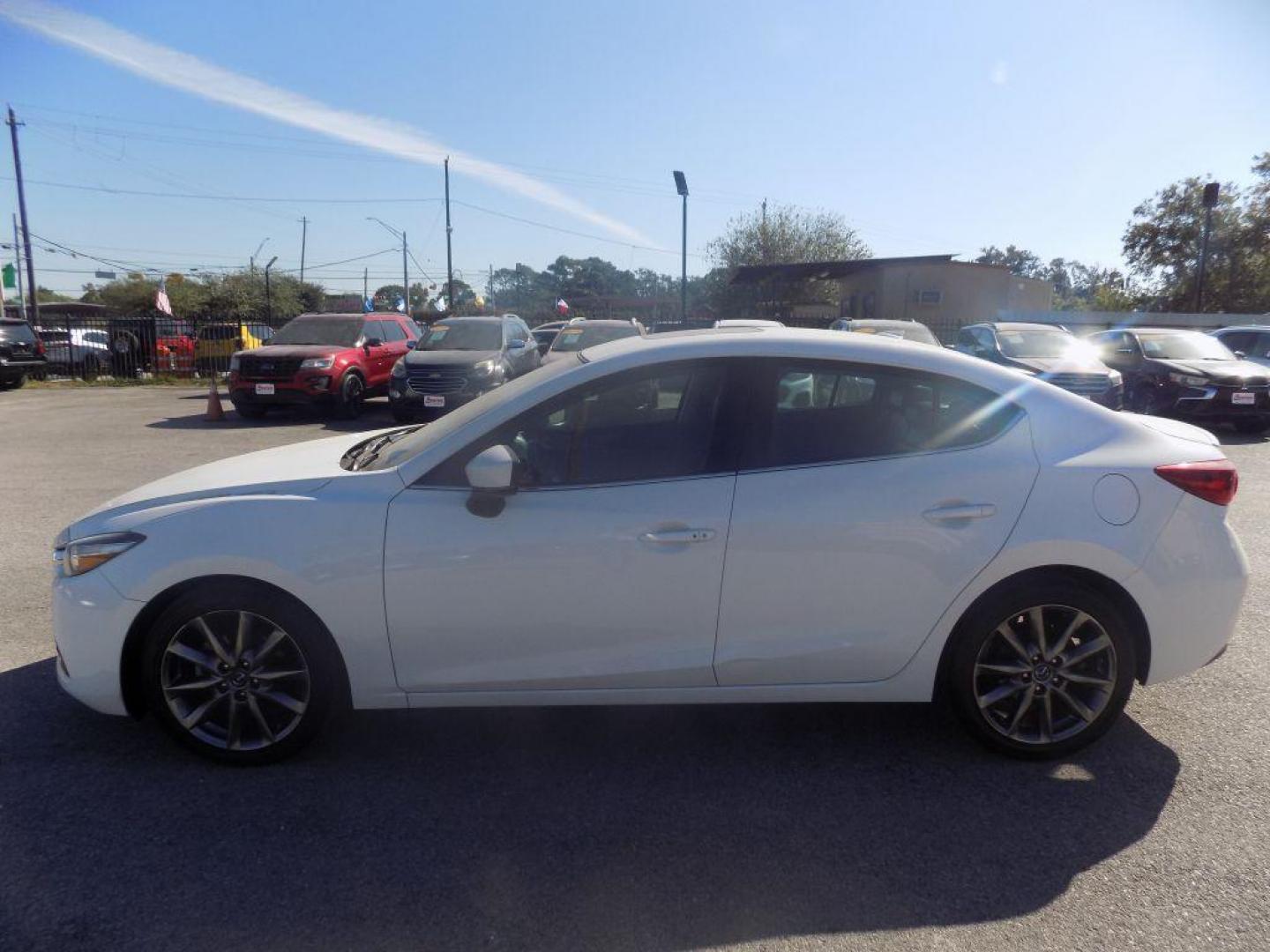 2018 WHITE MAZDA 3 TOURING (3MZBN1V39JM) with an 2.5L engine, Automatic transmission, located at 830 E. Canino Rd., Houston, TX, 77037, (281) 405-0440, 38.358219, -81.729942 - Photo#5