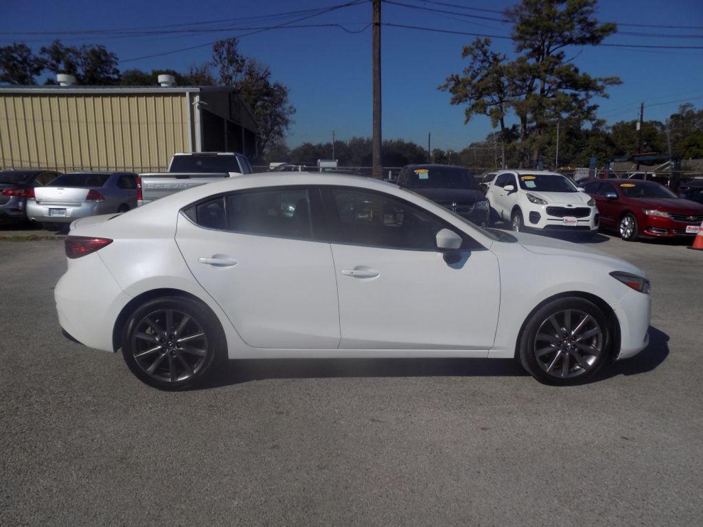 2018 WHITE MAZDA 3 TOURING (3MZBN1V39JM) with an 2.5L engine, Automatic transmission, located at 830 E. Canino Rd., Houston, TX, 77037, (281) 405-0440, 38.358219, -81.729942 - Photo#7