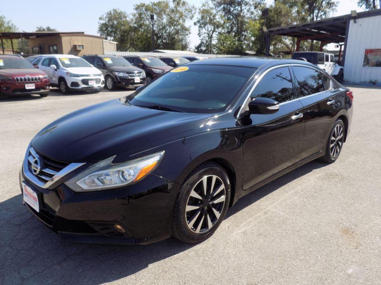 2018 BLACK NISSAN ALTIMA 2.5 (1N4AL3AP8JC) with an 2.5L engine, Continuously Variable transmission, located at 830 E. Canino Rd., Houston, TX, 77037, (281) 405-0440, 38.358219, -81.729942 - Photo#4