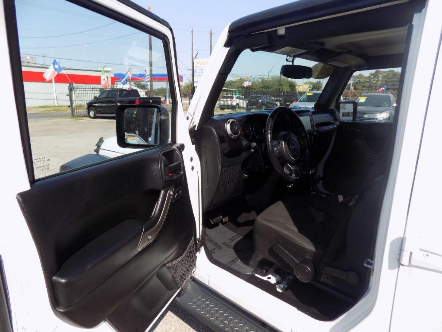 2014 WHITE JEEP WRANGLER UNLIMI SPORT (1C4BJWDG5EL) with an 3.6L engine, Automatic transmission, located at 830 E. Canino Rd., Houston, TX, 77037, (281) 405-0440, 38.358219, -81.729942 - Photo#13