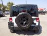 2014 WHITE JEEP WRANGLER UNLIMI SPORT (1C4BJWDG5EL) with an 3.6L engine, Automatic transmission, located at 830 E. Canino Rd., Houston, TX, 77037, (281) 405-0440, 38.358219, -81.729942 - Photo#2