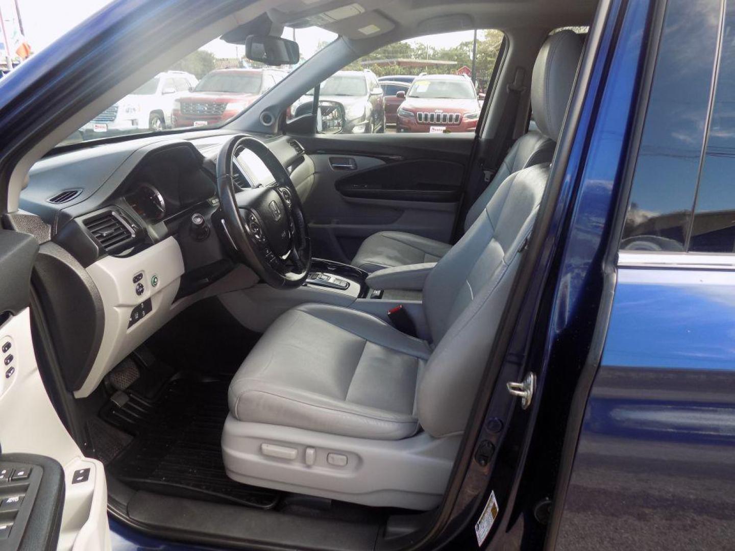 2017 BLUE HONDA PILOT TOURING (5FNYF5H98HB) with an 3.5L engine, Automatic transmission, located at 830 E. Canino Rd., Houston, TX, 77037, (281) 405-0440, 38.358219, -81.729942 - Photo#8