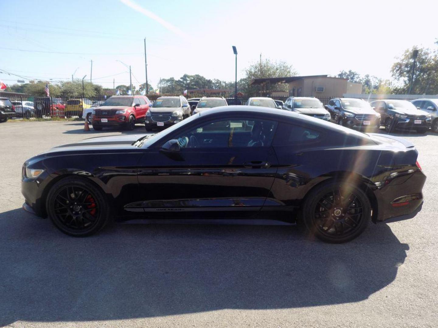 2016 BLACK FORD MUSTANG (1FA6P8TH5G5) with an 2.3L engine, Automatic transmission, located at 830 E. Canino Rd., Houston, TX, 77037, (281) 405-0440, 38.358219, -81.729942 - Photo#5