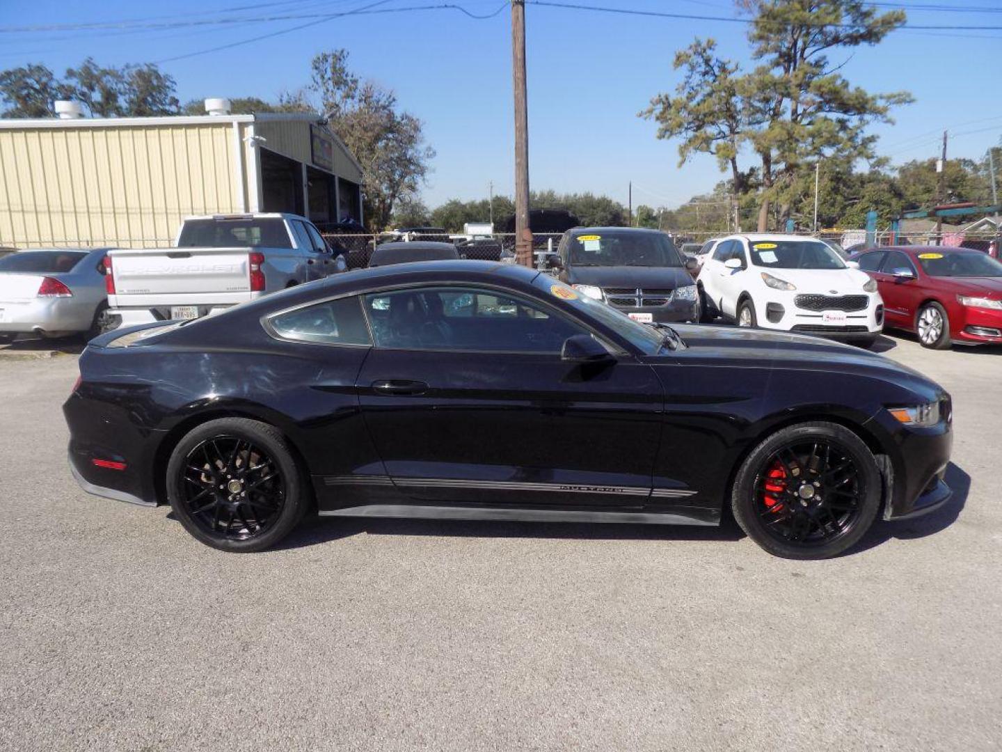 2016 BLACK FORD MUSTANG (1FA6P8TH5G5) with an 2.3L engine, Automatic transmission, located at 830 E. Canino Rd., Houston, TX, 77037, (281) 405-0440, 38.358219, -81.729942 - Photo#7