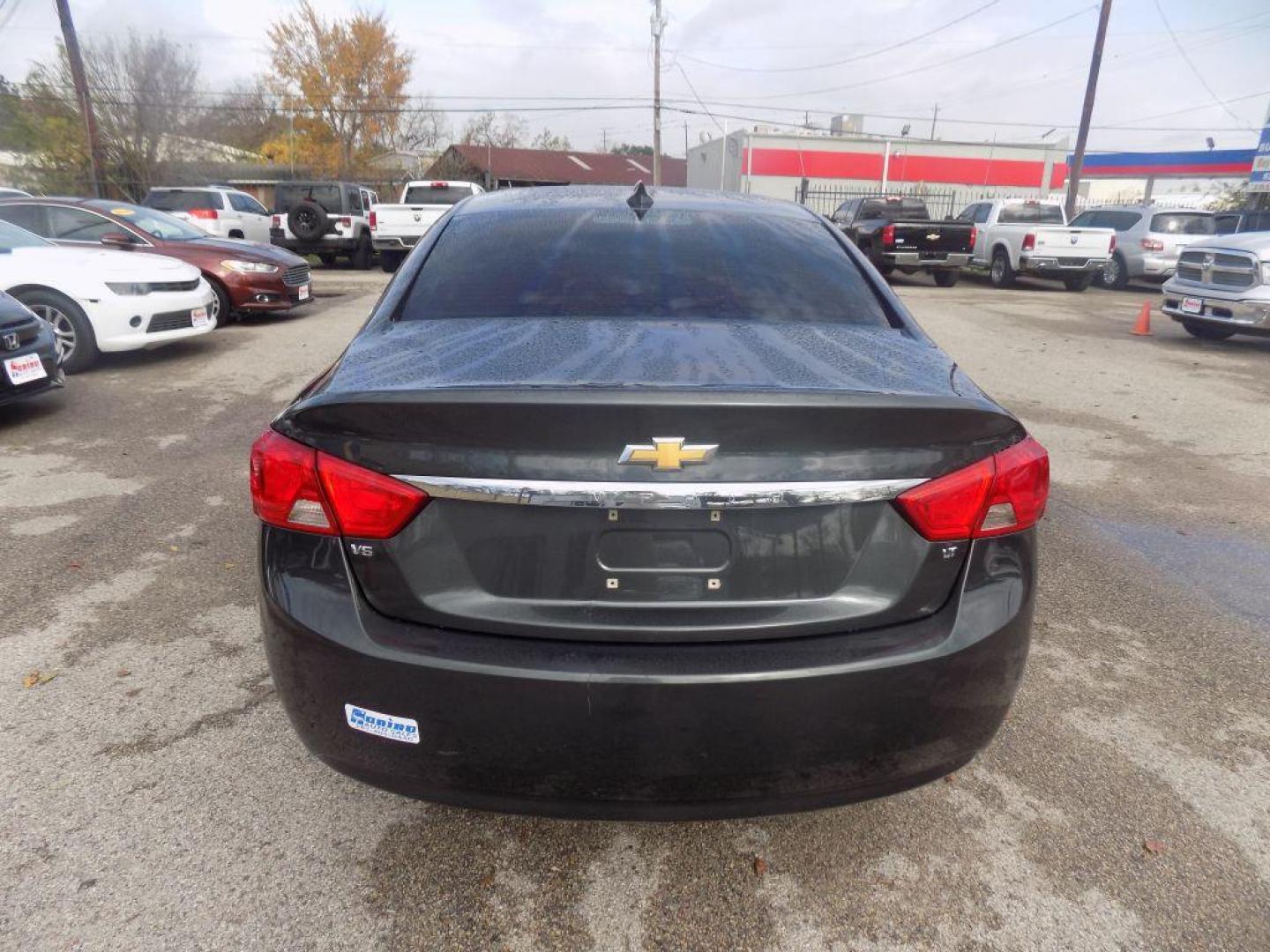 2018 GRAY CHEVROLET IMPALA LT (2G1105S33J9) with an 3.6L engine, Automatic transmission, located at 830 E. Canino Rd., Houston, TX, 77037, (281) 405-0440, 38.358219, -81.729942 - Photo#2