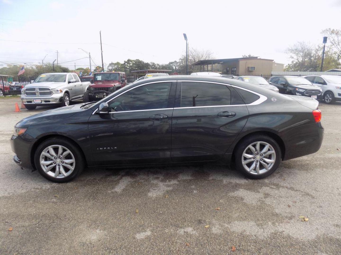 2018 GRAY CHEVROLET IMPALA LT (2G1105S33J9) with an 3.6L engine, Automatic transmission, located at 830 E. Canino Rd., Houston, TX, 77037, (281) 405-0440, 38.358219, -81.729942 - Photo#3