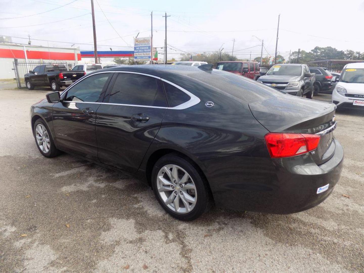 2018 GRAY CHEVROLET IMPALA LT (2G1105S33J9) with an 3.6L engine, Automatic transmission, located at 830 E. Canino Rd., Houston, TX, 77037, (281) 405-0440, 38.358219, -81.729942 - Photo#4