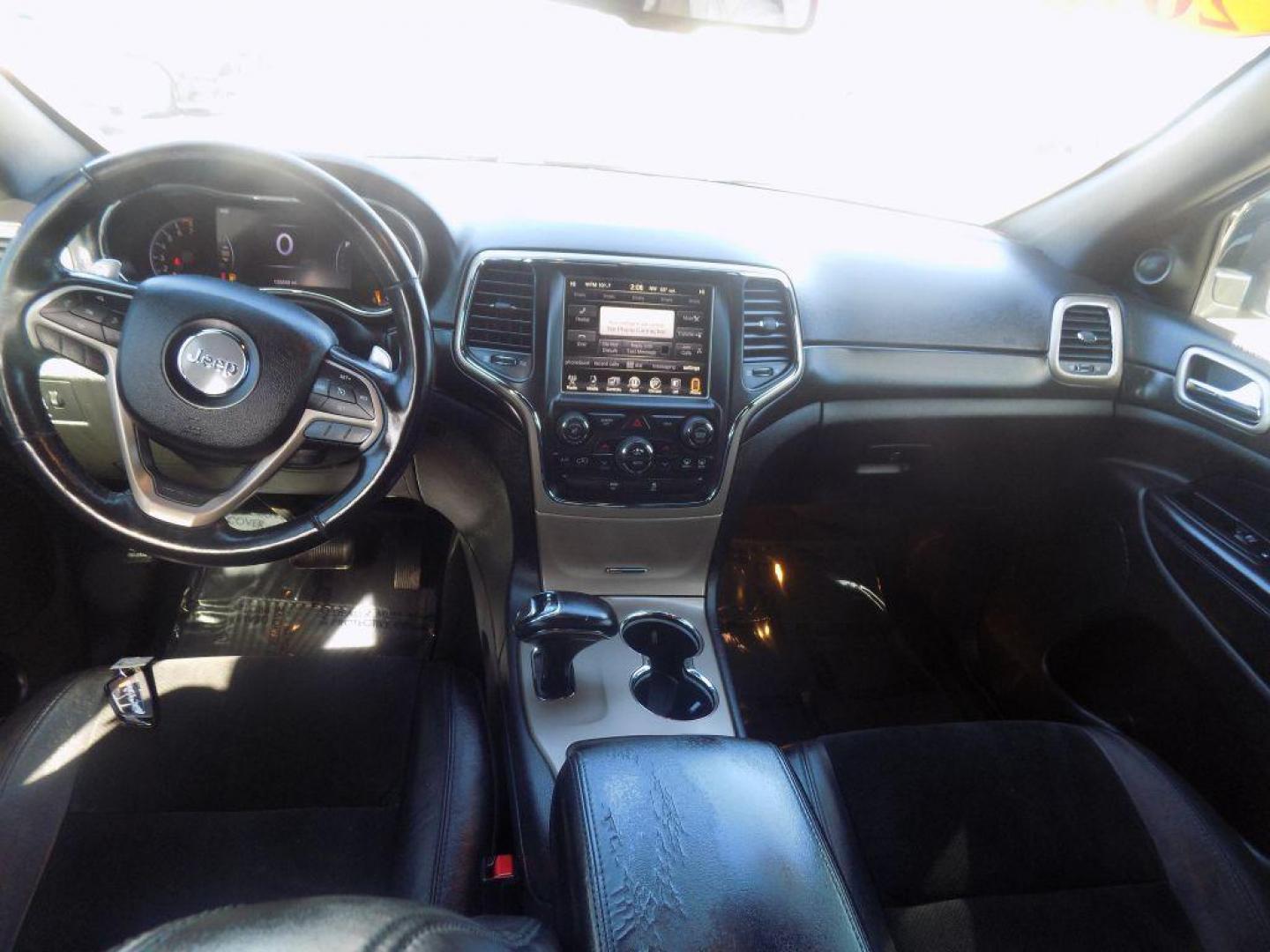 2015 BLACK JEEP GRAND CHEROKEE LAREDO (1C4RJEAG5FC) with an 3.6L engine, Automatic transmission, located at 830 E. Canino Rd., Houston, TX, 77037, (281) 405-0440, 38.358219, -81.729942 - Photo#14