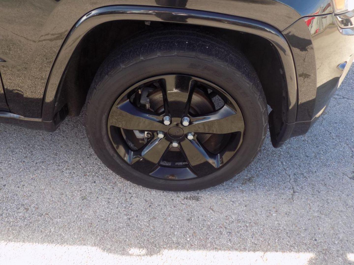 2015 BLACK JEEP GRAND CHEROKEE LAREDO (1C4RJEAG5FC) with an 3.6L engine, Automatic transmission, located at 830 E. Canino Rd., Houston, TX, 77037, (281) 405-0440, 38.358219, -81.729942 - Photo#19