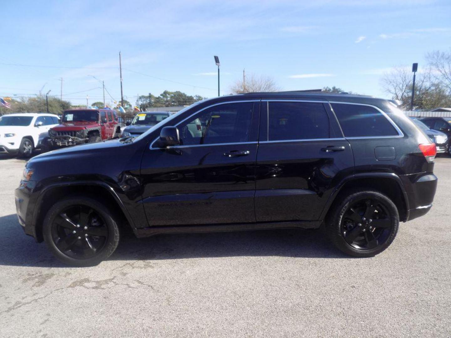 2015 BLACK JEEP GRAND CHEROKEE LAREDO (1C4RJEAG5FC) with an 3.6L engine, Automatic transmission, located at 830 E. Canino Rd., Houston, TX, 77037, (281) 405-0440, 38.358219, -81.729942 - Photo#3