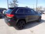 2015 BLACK JEEP GRAND CHEROKEE LAREDO (1C4RJEAG5FC) with an 3.6L engine, Automatic transmission, located at 830 E. Canino Rd., Houston, TX, 77037, (281) 405-0440, 38.358219, -81.729942 - Photo#7