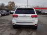 2016 WHITE JEEP GRAND CHEROKEE LIMITED (1C4RJEBG2GC) with an 3.6L engine, Automatic transmission, located at 830 E. Canino Rd., Houston, TX, 77037, (281) 405-0440, 38.358219, -81.729942 - Photo#2