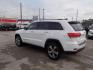 2016 WHITE JEEP GRAND CHEROKEE LIMITED (1C4RJEBG2GC) with an 3.6L engine, Automatic transmission, located at 830 E. Canino Rd., Houston, TX, 77037, (281) 405-0440, 38.358219, -81.729942 - Photo#4