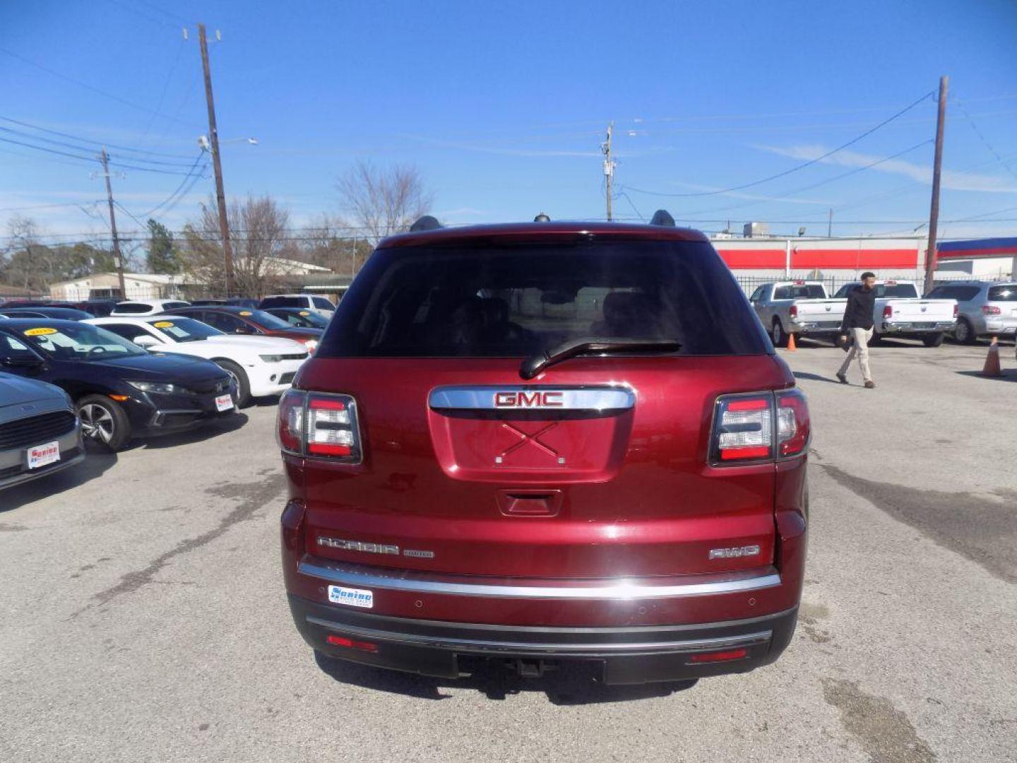 2017 RED GMC ACADIA LIMITED SLT-2 (1GKKVSKD2HJ) with an 3.6L engine, Automatic transmission, located at 830 E. Canino Rd., Houston, TX, 77037, (281) 405-0440, 38.358219, -81.729942 - Photo#2