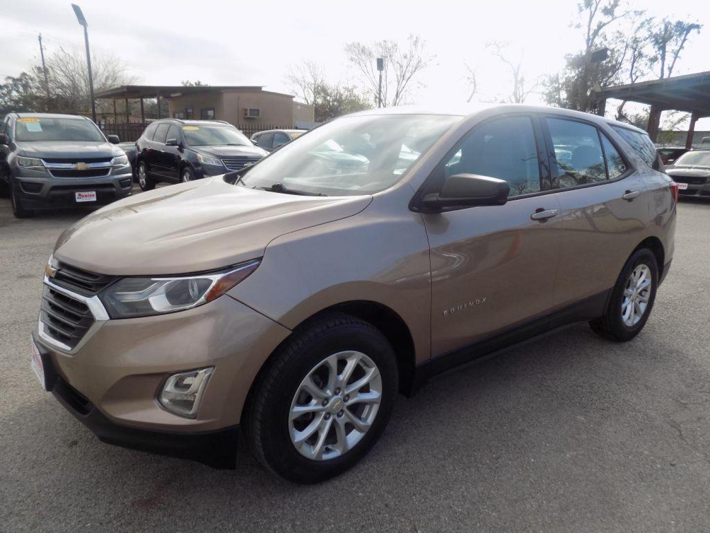 2019 GOLD CHEVROLET EQUINOX LS (2GNAXHEV9K6) with an 1.5L engine, Automatic transmission, located at 830 E. Canino Rd., Houston, TX, 77037, (281) 405-0440, 38.358219, -81.729942 - Photo#5