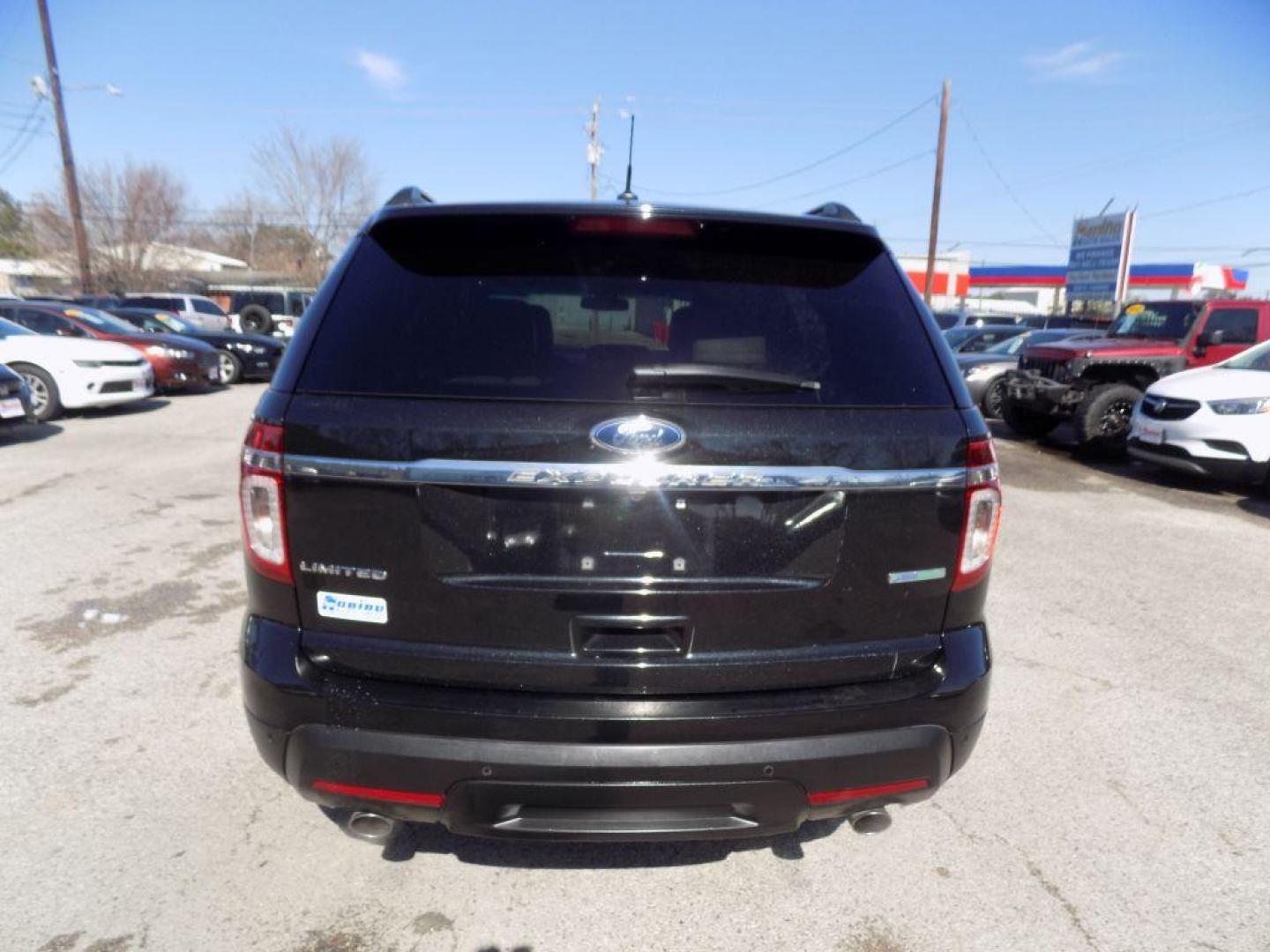 2015 BLACK FORD EXPLORER LIMITED (1FM5K7F98FG) with an 2.0L engine, Automatic transmission, located at 830 E. Canino Rd., Houston, TX, 77037, (281) 405-0440, 38.358219, -81.729942 - Photo#2